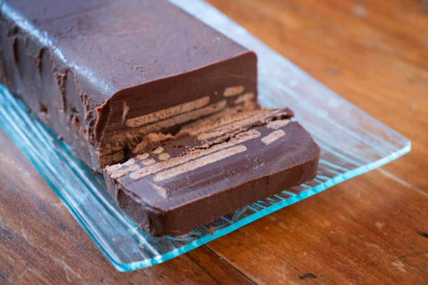 "Cold Dog" cake, or "Kalter hund", a dessert consists of butter biscuits layered in cocoa - coconut fat cream and is made by placing the biscuit layers one after the other in a loaf pan