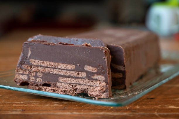 "Cold Dog" cake, or "Kalter hund", a dessert consists of butter biscuits layered in cocoa - coconut fat cream and is made by placing the biscuit layers one after the other in a loaf pan