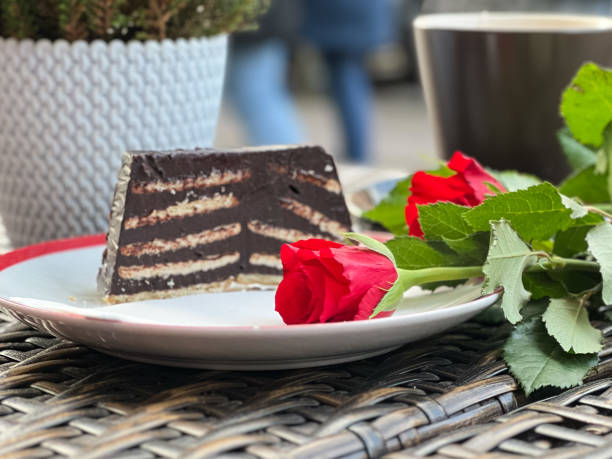 The original german  cake from Germany, called "Kalter Hund".An old recipe is based on biscuits with chocolate cream.A rarity!Decorated with a bouquet of roses.