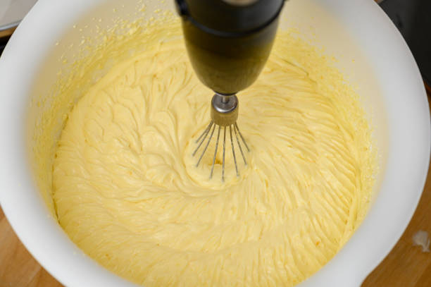 Whip the fluffy yellow egg cream in a bowl